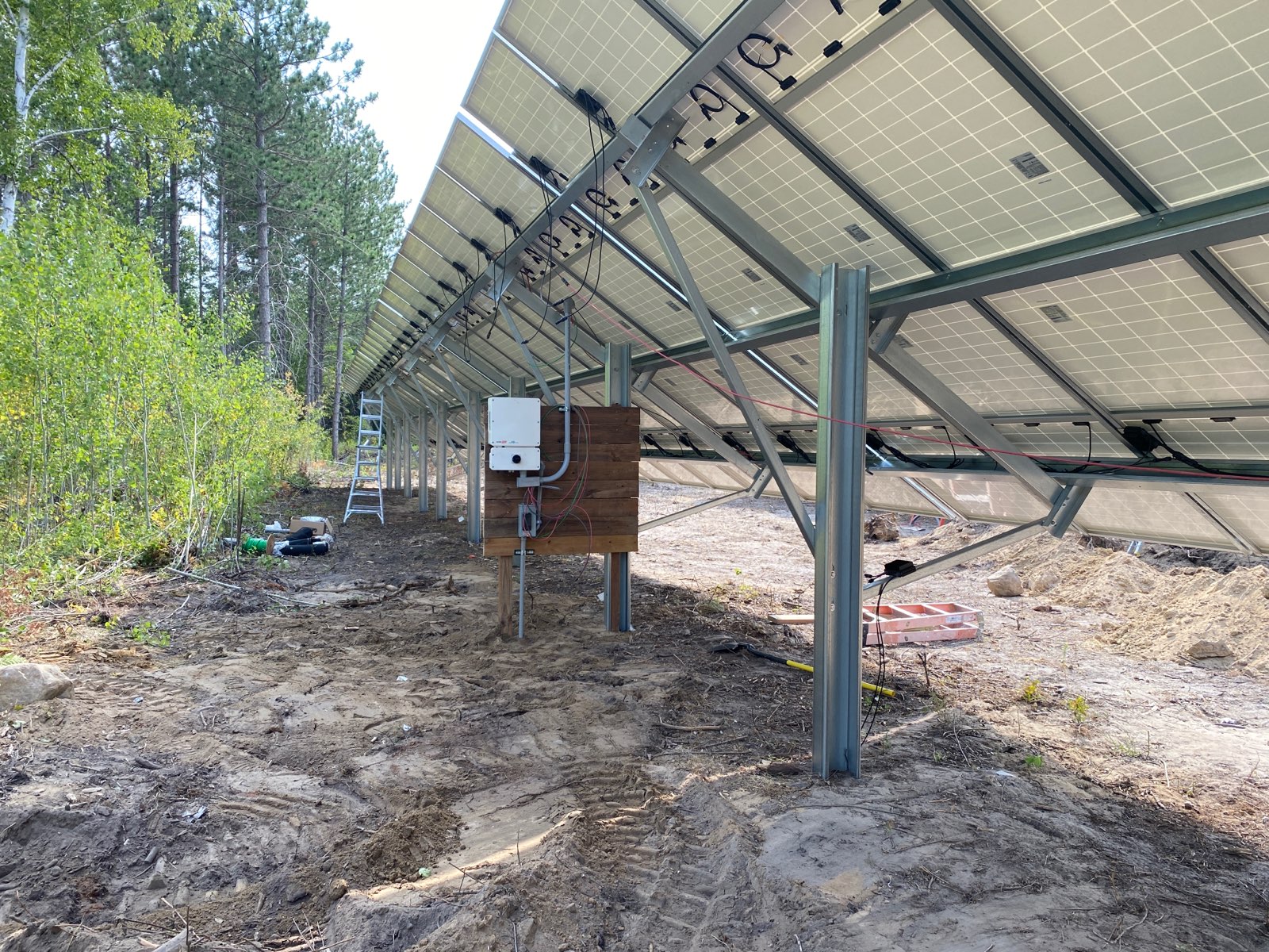 Electrical wiring under a large solar array