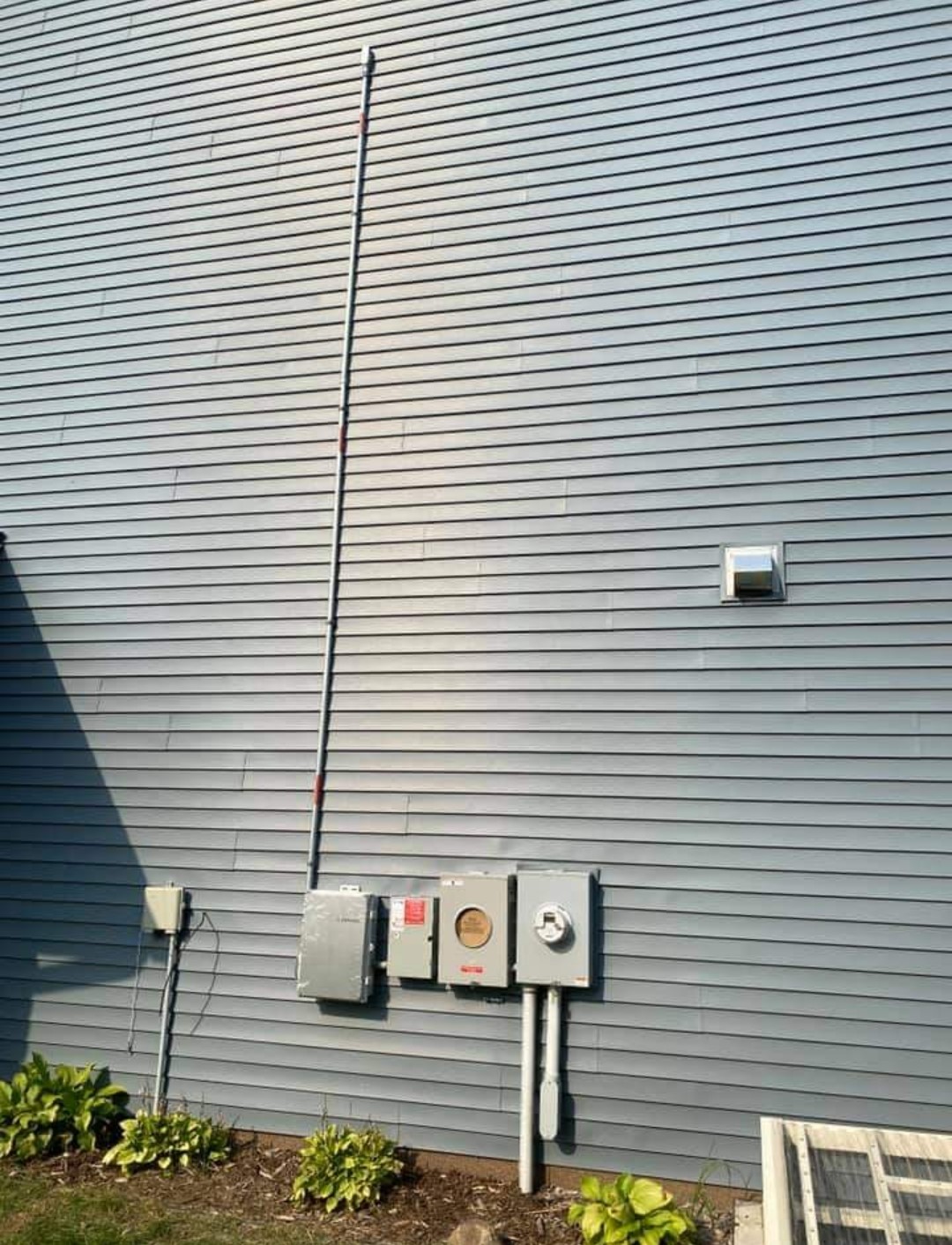 Electrical meters on the side of a building