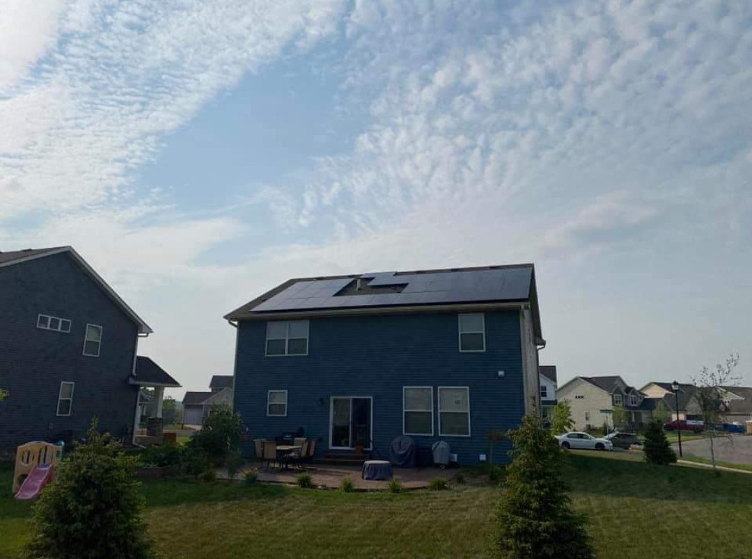A home with a full roof solar array